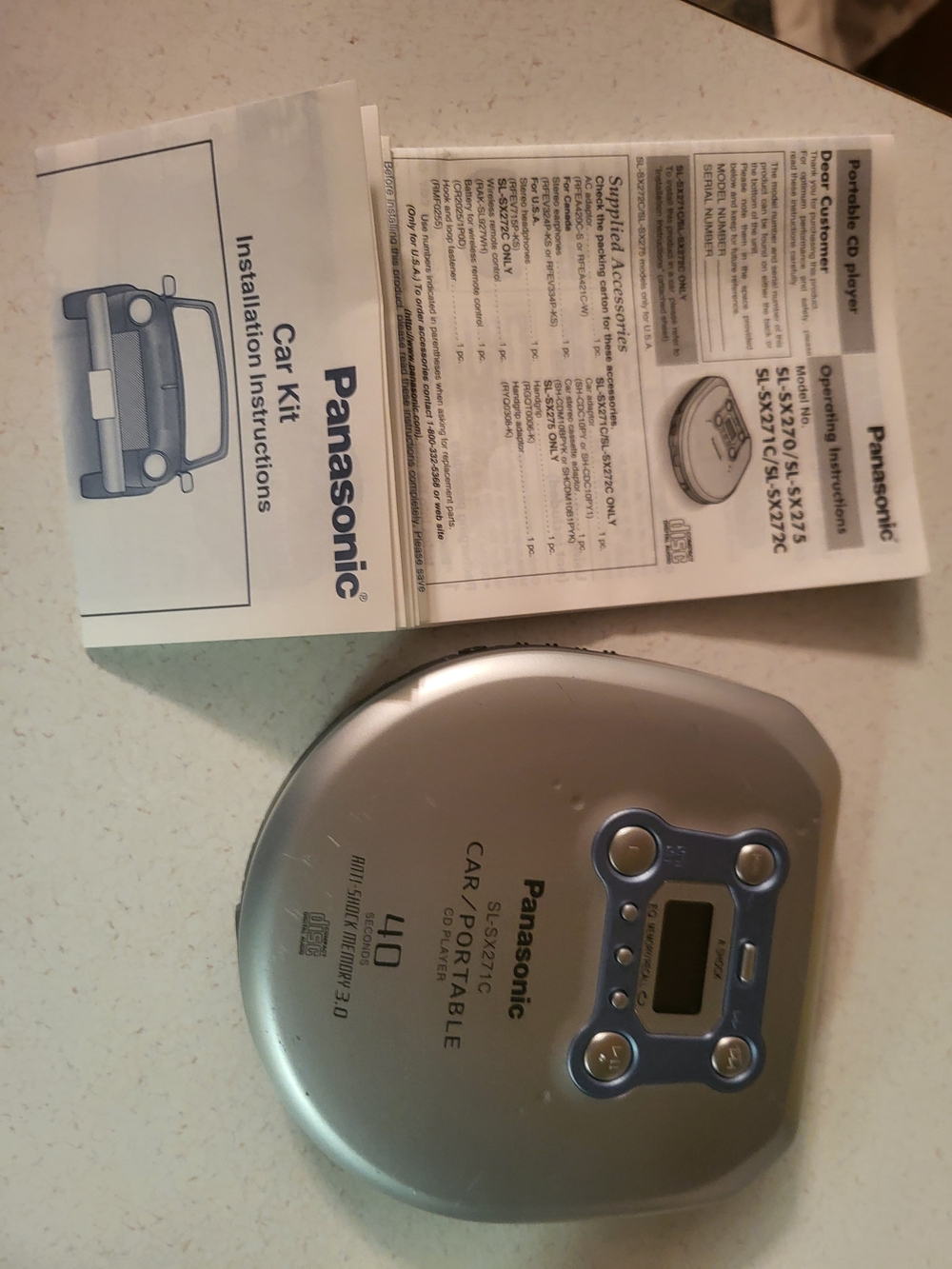 Panasonic Silver and Blue Portable CD Player with Car Kit Manual